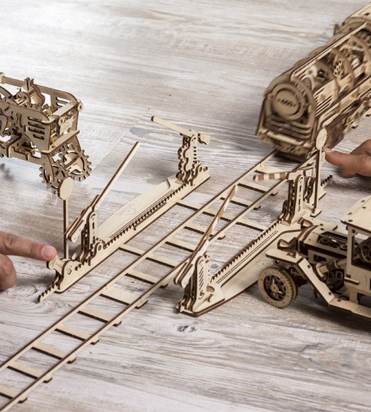 Ugears mechanical model kit Rails with Crossing and wooden 3D puzzle. 4 meters of tracks with crossing complete with stop signs and gates and part of railway. Original gift for boys and girls and smart hobby for grown-ups.
